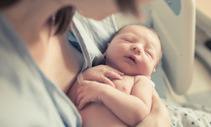 Mother holding newborn